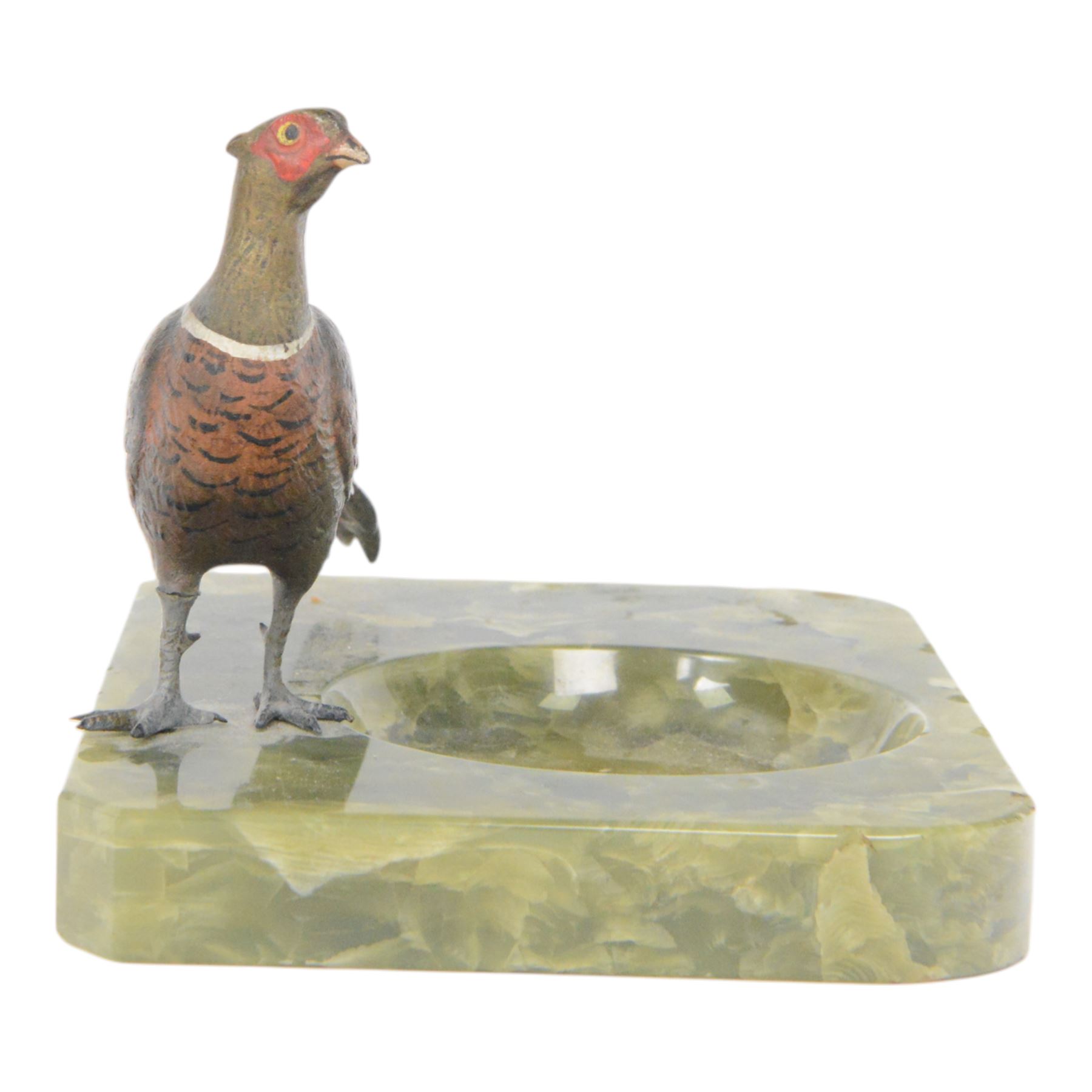 After Franz Bergman, 20th century cold painted bronze, of a pheasant, mounted on an onyx ashtray, H13cm, L22cm