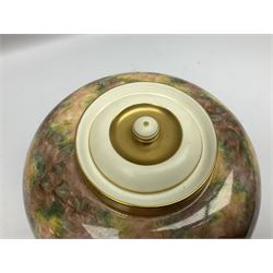 Mid 20th century Royal Worcester potpourri vase and cover decorated by Alan Telford, of ovoid form with inner cover and pierced gilt outer cover with bud finial, upon short gilt circular foot, the body part moulded with basket weave bands in gilt and bronze, and hand painted with a still life of fruit upon a mossy ground, signed Telford, with black printed mark beneath and painted shape number 1286, H25.5cm