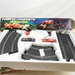 Scalextric - three part sets: Formula One, Jaguar Challenge and Ford RS Cosworth, all boxed