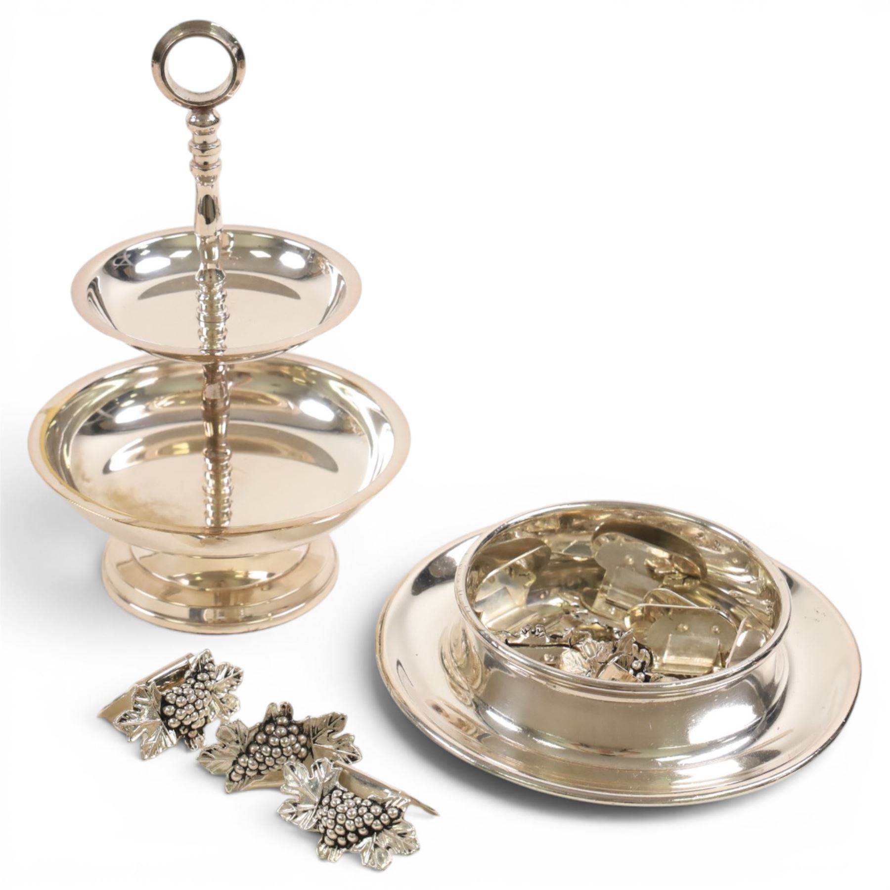 Set of twelve silver plate place holders, with grapes to the front, together with three bottle holders, butlers tray etc