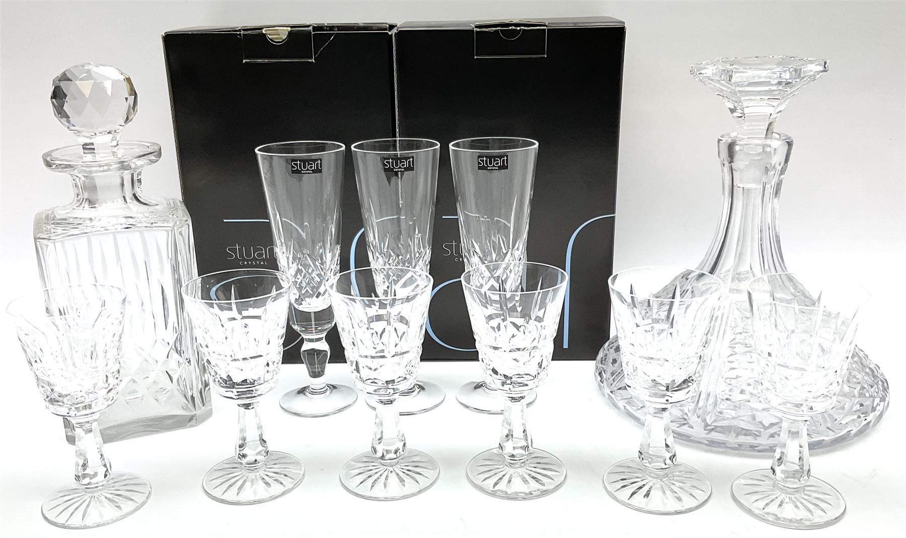 Set of six Waterford Crystal sherry glasses, together with three Stuarts Crystal Glengarry pattern flutes, a Stuart Crystal ships decanter, and an Edinburgh Crystal square section decanter. 