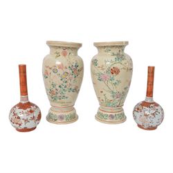 Japanese ceramics, comprising pair of Imari plates, pair of Imari bowls, pair of Satsuma bottle vases and two pairs of baluster form vases each decorated with birds amongst flowering branches, tallest vase H23cm