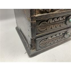 Late 19th century carved oak candle box with two drawers H39.5cm