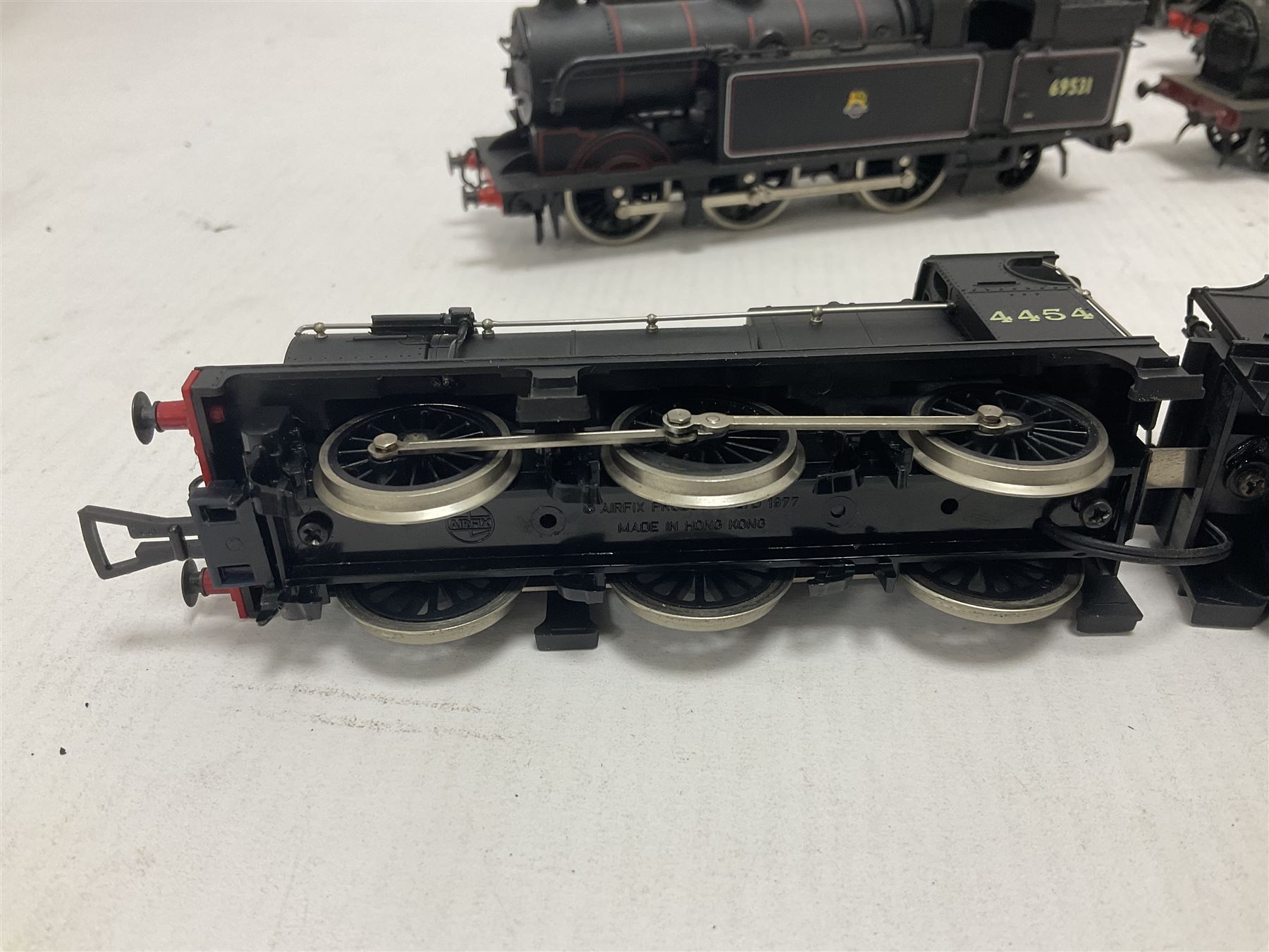 Airfix ‘00’ gauge - seven locomotives comprising Class 7P (Royal Scot) ‘Royal Scots Fusilier’ 4-6-0 no.6103 in LMS black with Mainline tender; two Class N2 0-6-2T no.69531 in BR black; Class 1282 2-4-0 no.20185 in LMS black; Class 61XX 2-6-2T no.6167 in BR black; Class 14XX 0-4-2T no.1466 in GWR green, all unboxed; Class 4F 0-6-0 no.4454 in LMS black, in original box (7)