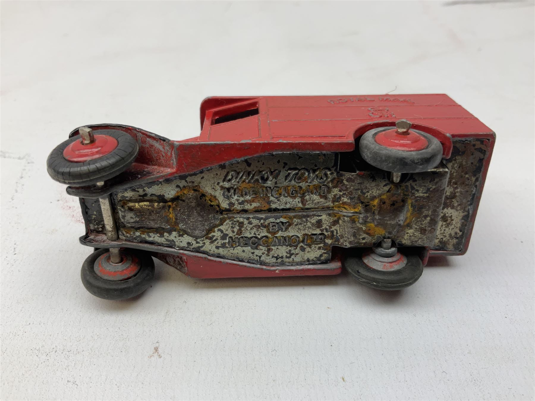 Dinky - five unboxed and playworn die-cast models comprising Supertoys Big Bedford Van 'Heinz' No.923; A.E.C. Monarch Thompson Tank; Maserati Racing Car No.231; H.W.M. Racing Car 23J; and Royal Mail Van; together with a Corgi Mobilgas Tanker (6)