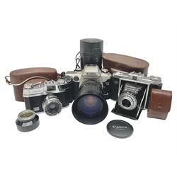 Canon EOS 50e camera body, serial no 8305671 with 'Canon Zoom EF 35-135mm 1:4-5.6' lens together with Halina 35X super camera body, with 'Halina Anastigmat f.c. 1:3.5 f=45mm' lens and other camera equipment 