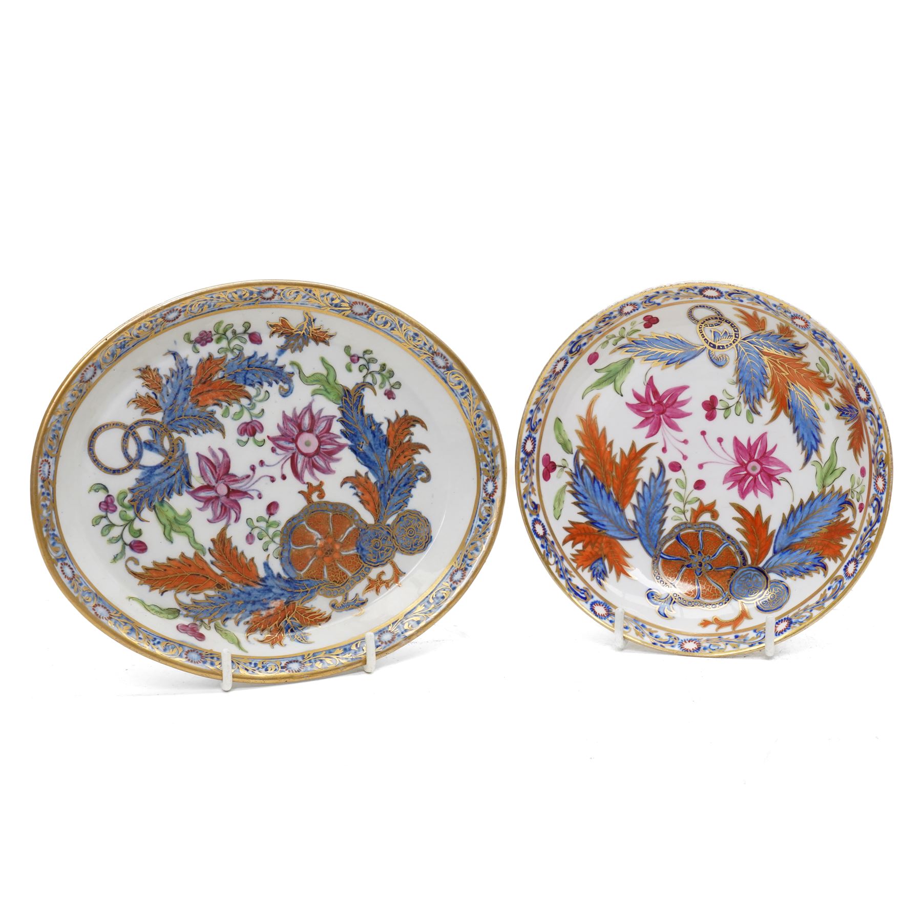 New Hall part tea and coffee service richly decorated  with a Tobacco Leaf design in pattern 274 comprising nine tea cups, eight coffee cans, ten saucers, tea pot and stand, sucrier and cover, slop bowl, milk jug and plate, circa 1800