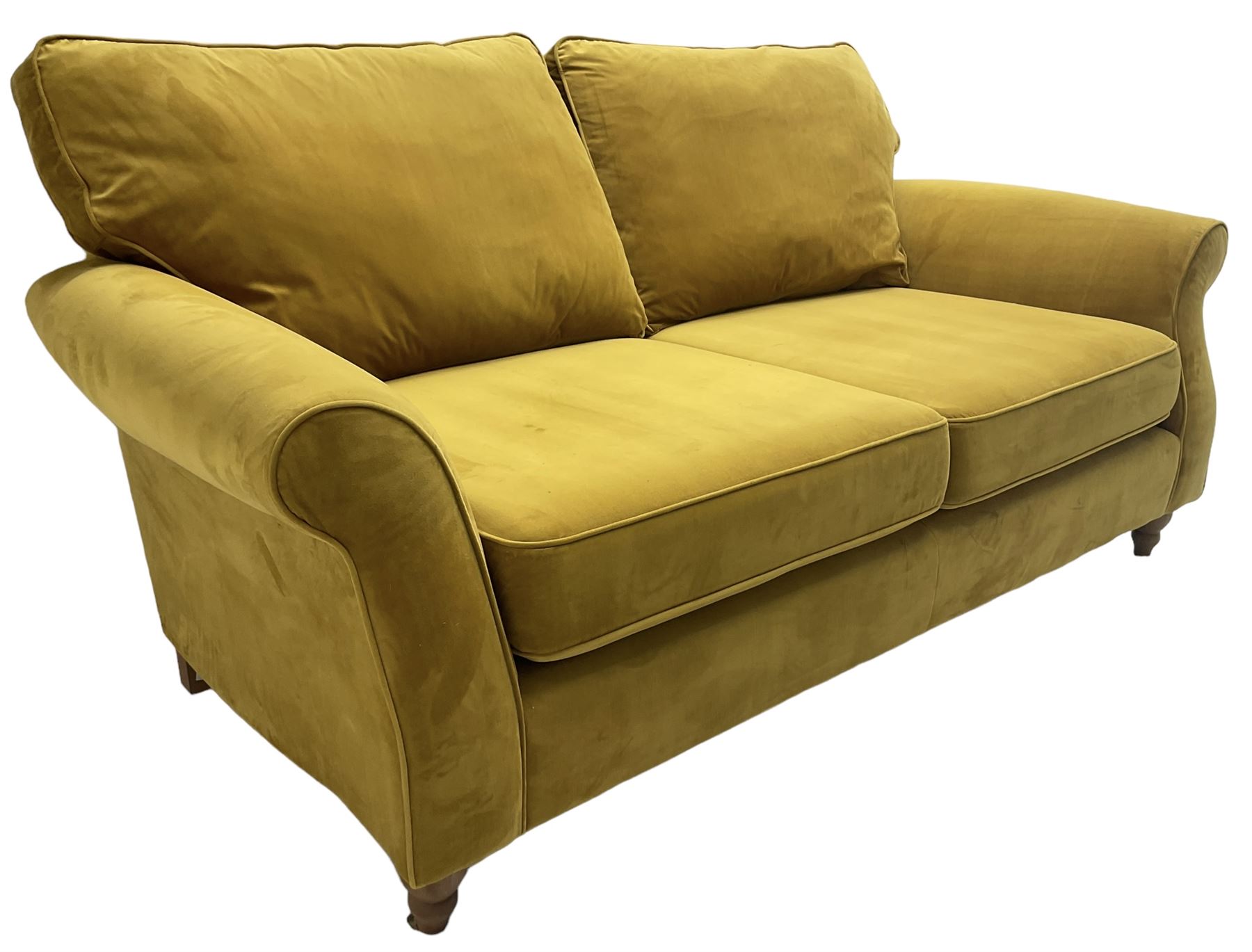 Next Furniture - traditional shaped three-seat sofa, upholstered in mustard velvet, rolled arms with pipping, on turned front feet