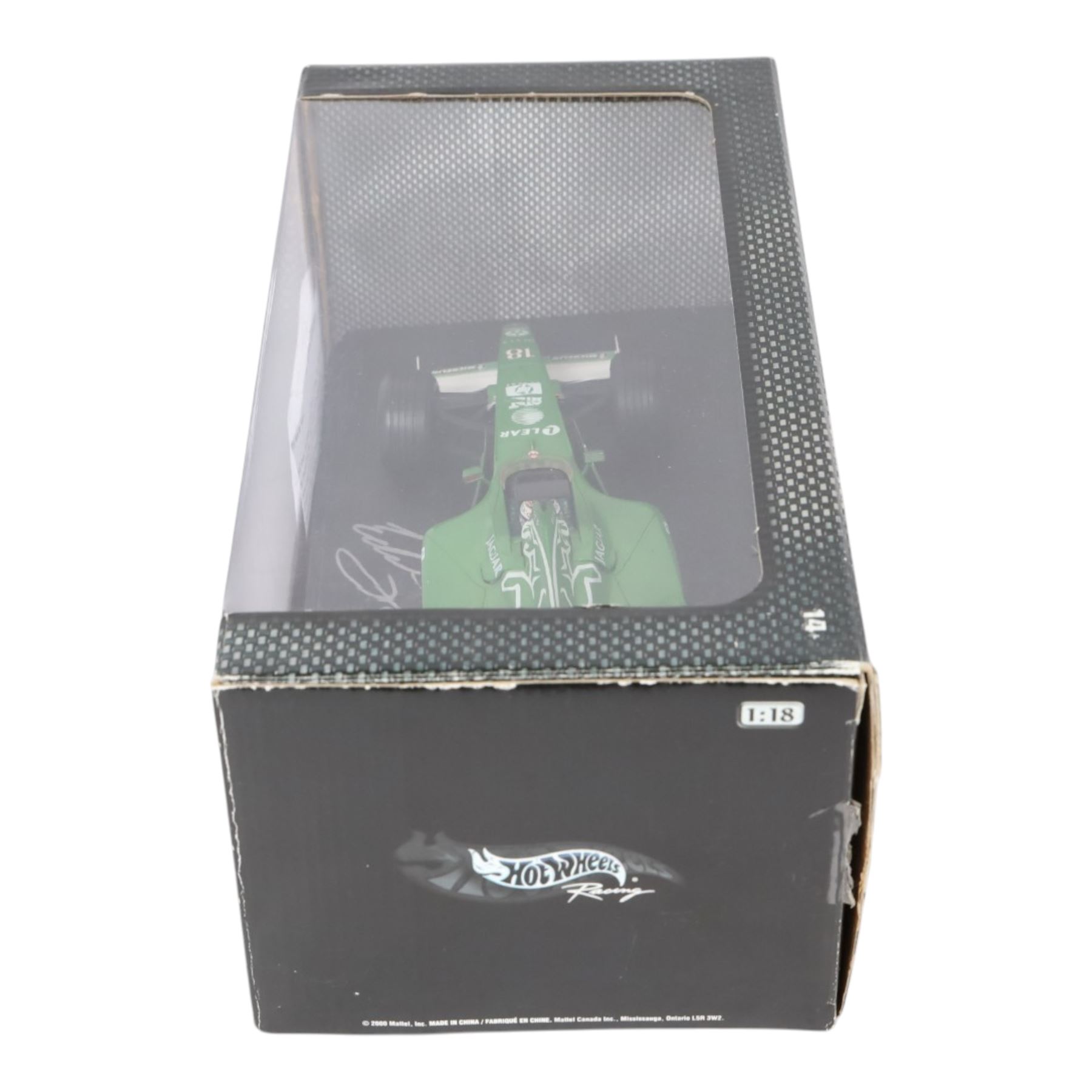 Three signed limited edition 1:18 scale Formula One models, comprising Hot Wheels Jordan EJ12 signed by Takuma Sato, Hot Wheels Jaguar Racing R2 signed by Eddie Irvine and a Minichamps Williams F1 Team model signed by Jenson Button, 1:18 scale model, all boxed