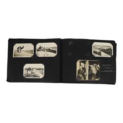 20th century photograph album belonging to Mr S. Wallis of Whitby, the photographs documenting his life on the sea, during his time in the Navy aboard MV Laurelwood and his return to Whitby, including the Japanese attack on Woosung China 1931, a lumber camp in Canada 1929, Timbi Island Santos 1929, whaling on board S.S Curacoa, Whitby railway strike 1927, Whitby Regatta 1958, etc