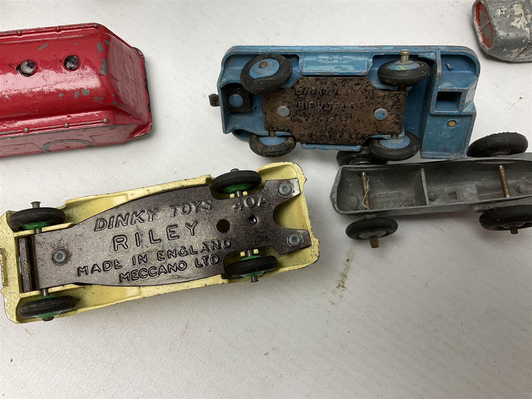 Dinky - sixteen unboxed and playworn die-cast models including Foden lorry, Big Bedford lorry with Halesowen Farm Trailer, Thunderbolt land speed record car, Spirit of the Wind racing car, market garden truck, Bedford tipper, station wagon, tanker, motorcycle combination etc; two Corgi models; and five Matchbox/Lesney models (23)