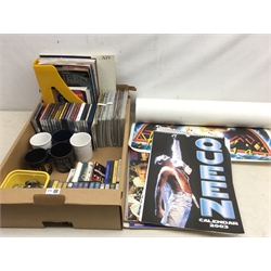  Collection of Queen memorabilia incl. cassette singles and tapes, CD's, LP and singles, mugs, pin and cloth badges, calendars, fan club magazines and posters etc  