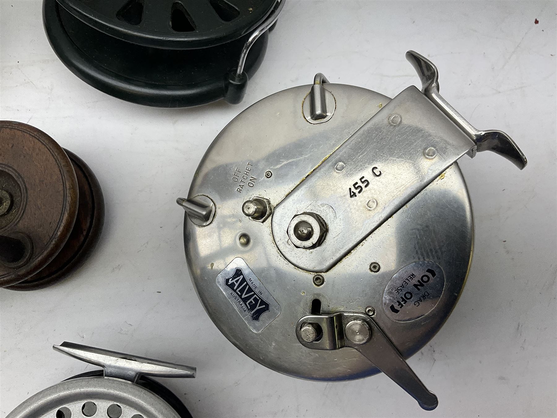 Fishing tackle, including 'The Gnat' fly reel, Alvey 4 1/2 inch reel, Paramount 4 1/2 inch reel, other fishing reels, various fishing flies and other similar items in a carry bag 