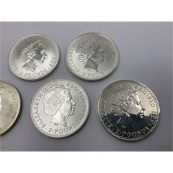 Five Queen Elizabeth II United Kingdom one ounce fine silver Britannia two pound coins dated 1997, 1998, 1999, 2000 and 2001 