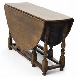 17th century design oak gateleg dining table, oval drop-leaf top on baluster turned suppor...