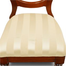 Set of twelve Victorian walnut balloon-back dining chairs, shaped open back over seats upholstered in striped ivory fabric, moulded seat rail above turned and tapering suppors