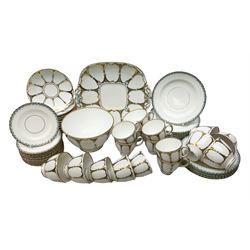 Victorian Davenport part tea service, comprising eight tea cups, twelve tea saucers, nine coffee cups, eleven coffee saucers, slop bowl, and cake plate, decorated in pattern number 2594, various marks, including some with Victorian registration lozenge 