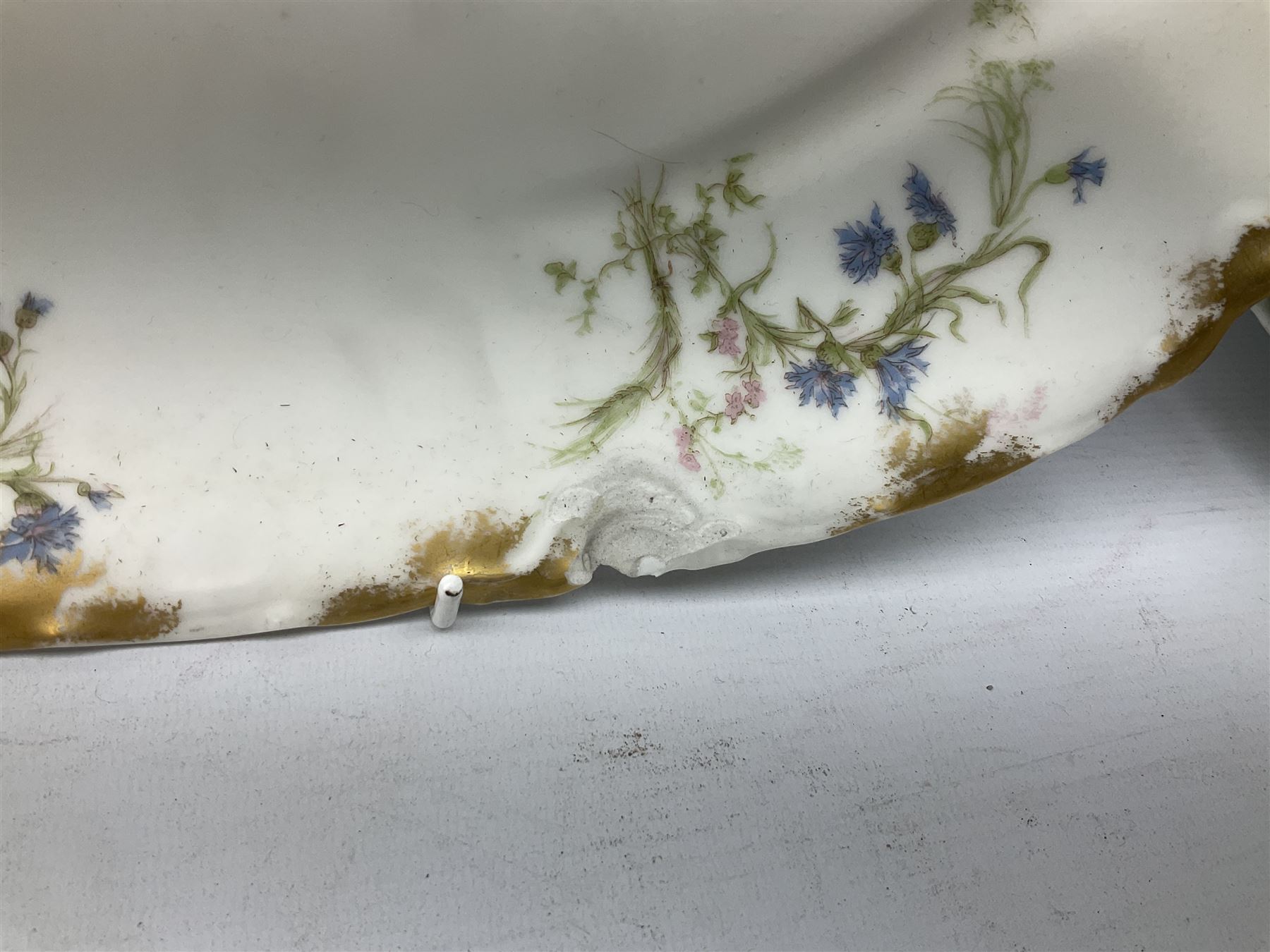 French Haviland Limoges part dinner service, decorated with floral sprays and gilding, to include two lidded tureens, thirteen plates, oval serving platter, etc, all stamped H & Co Made in France for James Green & Nephew (17) 