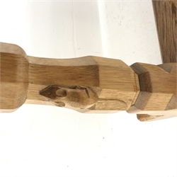'Mouseman' oak coffee table, rectangular adzed top, two octagonal pillar supports on sledge feet connected by floor stretcher, by Robert Thompson of Kilburn, 91cm x 38cm, H44cm