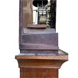 William Gostling of Diss  (Norfolk)-  Late 18th century 8-day oak longcase clock c1780-90, break arch top with scalloped cresting and three brass finials, glazed break arch hood door flanked by turned pilasters with brass capitals, trunk with a long trunk door and rounded top on a square plinth with an applied and shaped skirting, early painted Wilson of Birmingham dial with Roman numerals and five minute Arabic's, matching steel hands and second pointer, arched square ended calendar aperture with date disc behind, floral spandrels within gesso borders and a painted rocking automaton representing Mercury to the break arch, dial pinned via a false plate to a weight driven rack striking movement with a recoil anchor escapement, striking the hours on a cast bell. With pendulum weights and key. 
William Gostling (II) is recorded as working in Diss from 1774 to 1797, succeeded by widow Anne and son George . The dial of this clock is illustrated and discussed in detail in M.F. Tennants book 