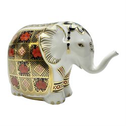 Royal Crown Derby paperweight, Elephant, printed in the 1128 pattern, trunk raised, gold stopper, H10cm
