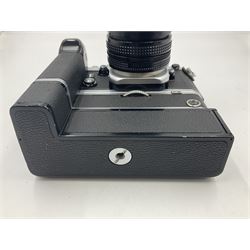 Nikon F2A Photomic camera body, serial no. 7844439, with 'Nikon Zoom-NIKKOR 35-70mm 1:3.5-4.8' lens, serial no. 5352031, Nikon MD1 Motor Drive, serial no. 208608 and Nikon MB1 battery pack