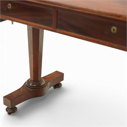 William IV mahogany sofa table, the rectangular top with rounded corners and hinged drop leaves to either end, above a shallow frieze fitted with two drawers opposing conforming dummy drawers, supported on octagonal tapering legs with ring turnings, joined by a shaped stretcher and raised on platform bases with scroll feet