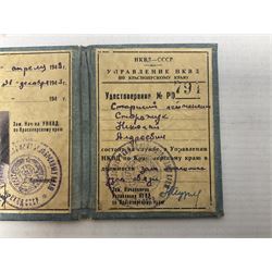 WW2 Soviet KGB officer I.D. book containing photograph, seal stamps and signatures. Roughly translates as 'USSR Peoples Commissariat for Internal Affairs Krasnoyarsk Region Directorate Senior Lieutenant 1st Class Deputy Head of Communications Nikolay Storozhuk c1943
