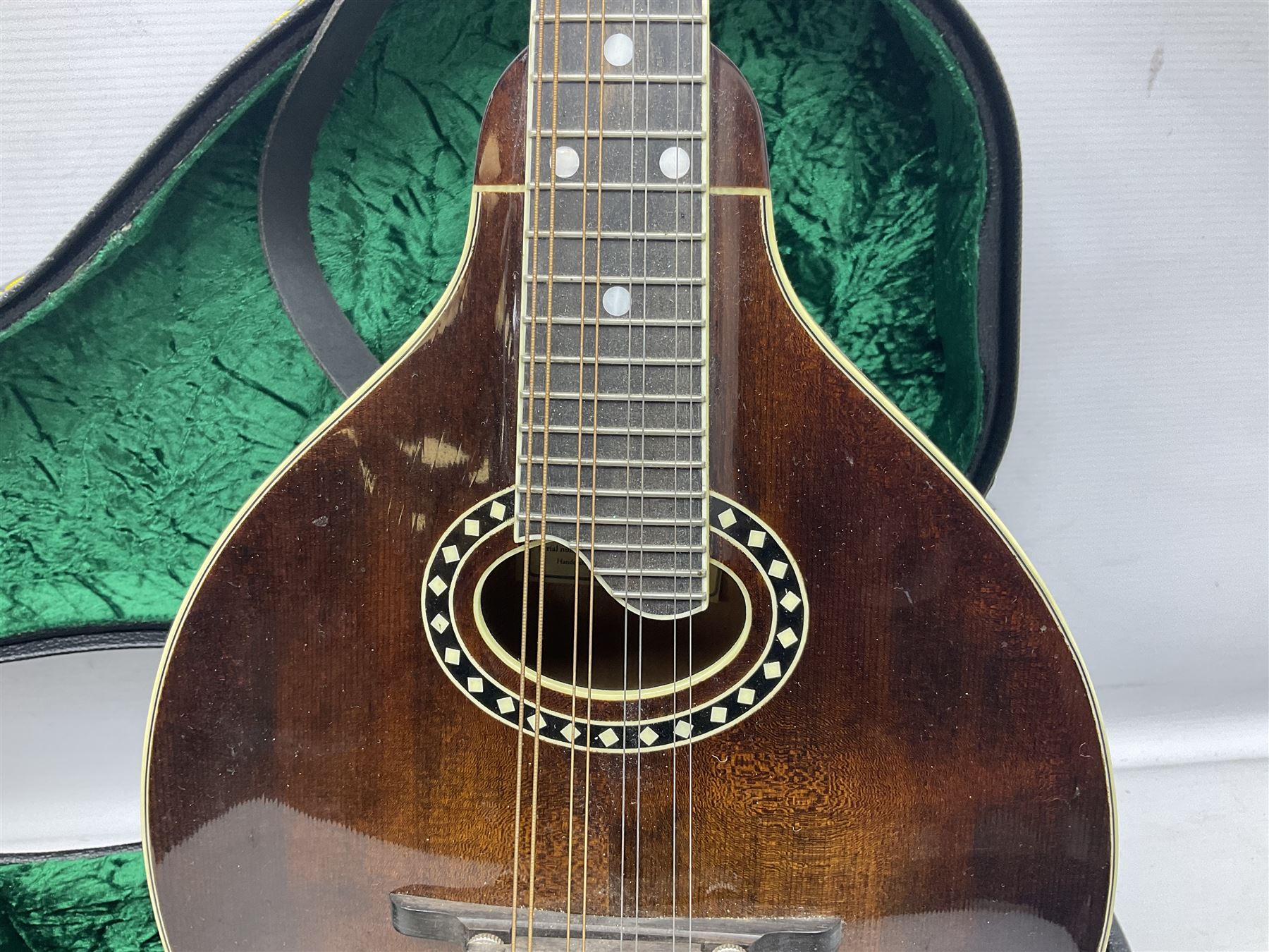 Eastman eight-string mandolin model MD504, serial no.140435406, L66cm; in TGI hard carrying case; together with case of instructional CDs