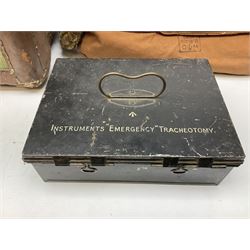 WW2 British Army RAMC 'Regimental Medical Pannier', well marked externally and dated 1941, stamped May 1943 internally, canvas covered wicker form with leather edges, hinged top and fall front with two rope carrying handles, fitted iron locking straps with securing chains; contains various unused field dressings and bandages with WW2 dates and two pillows; original label under lid L79cm