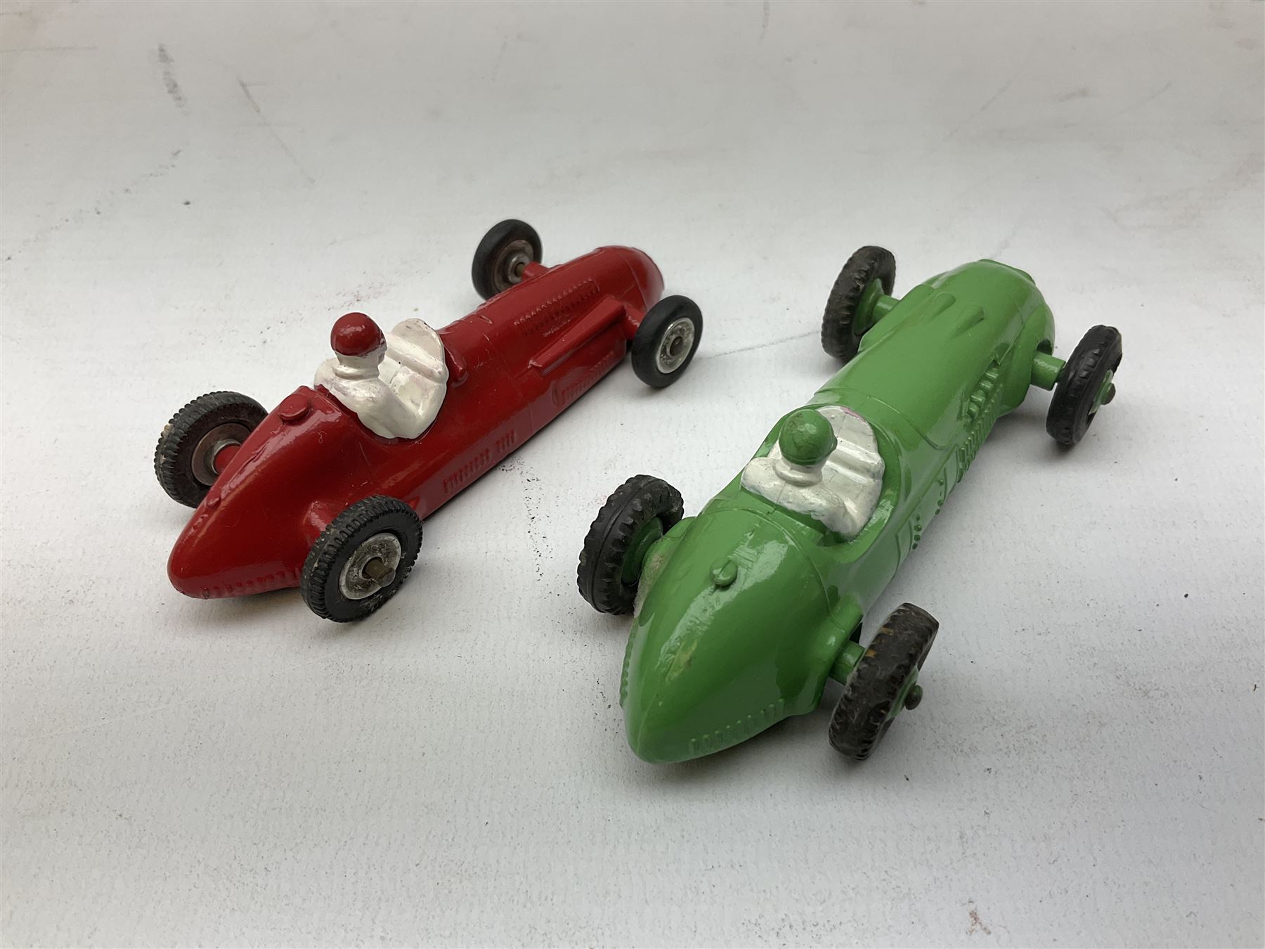 Dinky - five unboxed and playworn die-cast models comprising Supertoys Big Bedford Van 'Heinz' No.923; A.E.C. Monarch Thompson Tank; Maserati Racing Car No.231; H.W.M. Racing Car 23J; and Royal Mail Van; together with a Corgi Mobilgas Tanker (6)