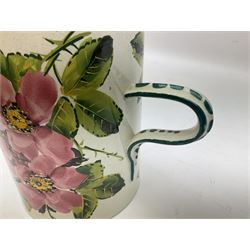 Early 20th century Wemyss large mug in wild rose pattern, decorated with pink roses and green lined boarder H14cm