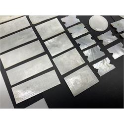 Collection of fifty seven Chinese mother of pearl gaming counters or tokens, of various size and form including rectangular, circular and fish shaped examples, various decoration including floral motifs, largest rectangular examples L6cm