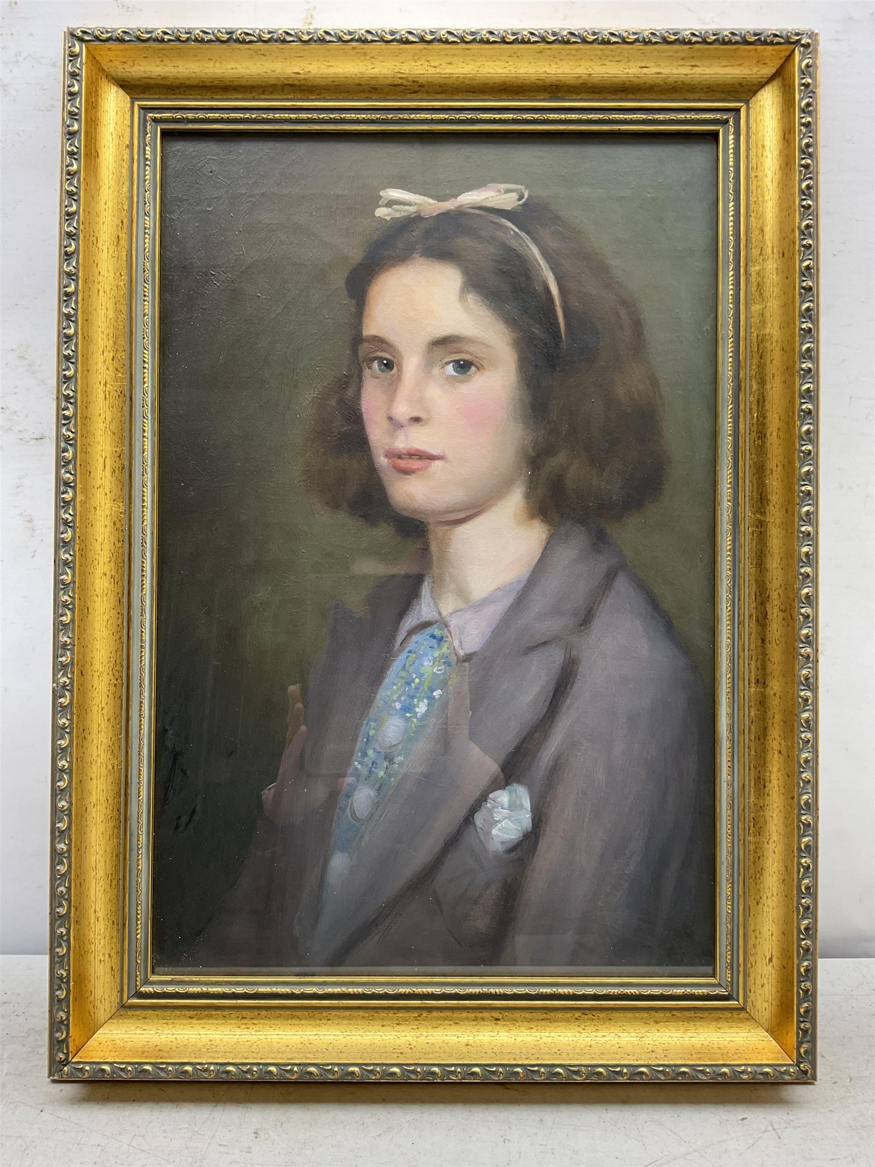 English School (Early 20th century): Young Girl with a Bow, oil on canvas unsigned 52cm x 34cm