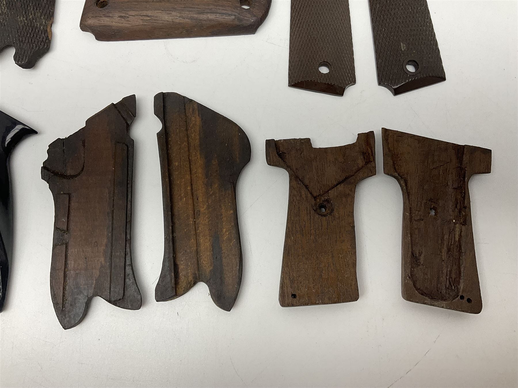 Six pairs of revolver grips;  pair of Lightwood & Son Ltd powder/shot measures in original box; and boxed Colt hammer shroud 