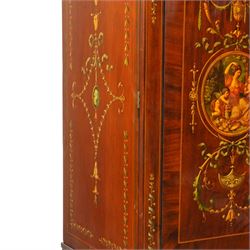 19th century French Louis XVI design mahogany and polychrome painted gentleman's press wardrobe - projecting cavetto cornice with urn and bellflower painted frieze, the twin doors with classical figural medallions surmounted by urns and festoon decoration with scrolling acanthus leaves, enclosing five sliding trays, the base fitted with two short over three long cock-beaded drawers, the facias painted with interlocking swags and garlands of bouquets with recumbent lion brass handle-plates, lower reeded edge on turned feet
