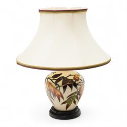 Moorcroft Sumac Tree pattern table lamp, designed by Phillip Gibson, the body decorated wi...