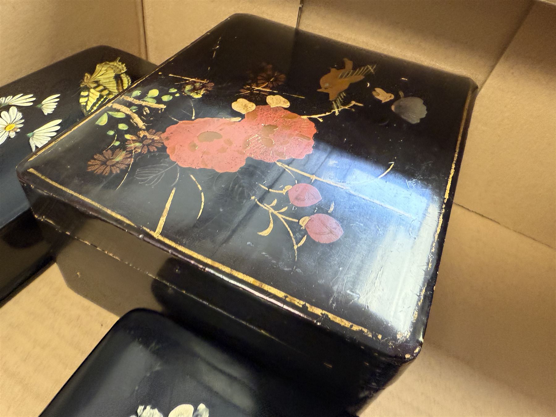 Papier mache boxes, including glove box, jewellery box and two square boxes and a crumb tray