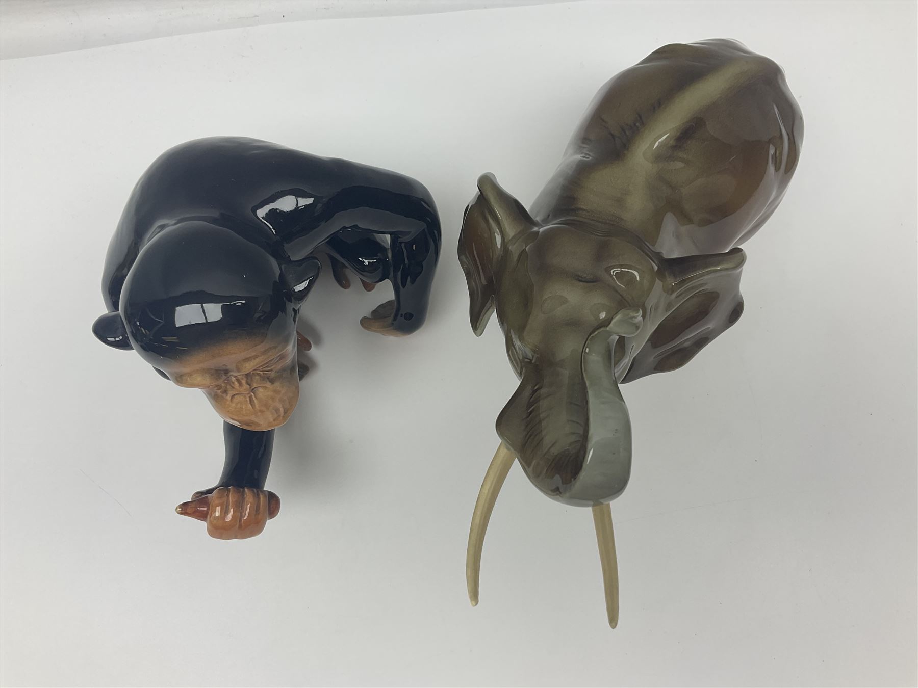 Large Sylvac monkey together with three smaller monkeys, together with Beswick Pigeon no 1383, Melba Ware hippo and baby and Royal Dux elephant 