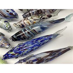 Collection of mid 20th century murano style glass fish, each with multi coloured inclusions largest L42cm