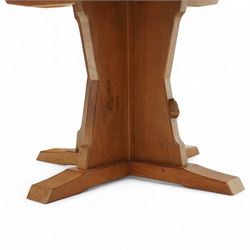 Rabbitman - circular oak dining table, adzed oak octagonal concave dining table, raised on a cruciform base, the supports and sledge feet also adzed, carved with rabbit signature, by Peter Heap of Wetwang