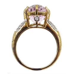 9ct gold oval kunzite ring with diamond set shoulders and gallery,  hallmarked