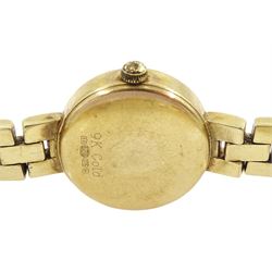 Rotary ladies 9ct gold quartz wristwatch, mother of pearl dial, on integral 9ct gold bracelet, stamped 375