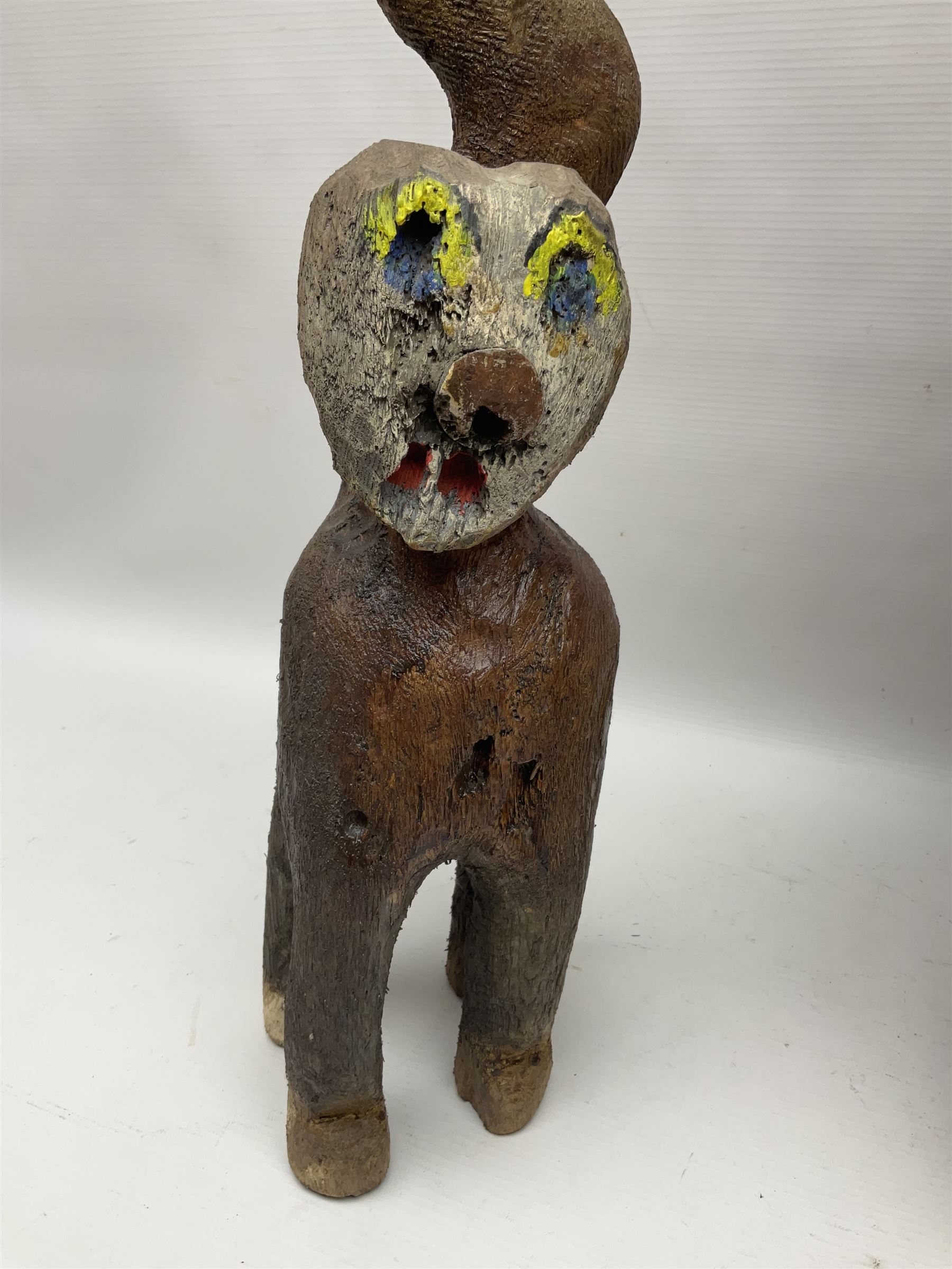 Helen Skelton (British 1933 – 2023): Three carved wooden abstract sculptures, each modelled as a cat, with carved or painted features, largest H63cm. Born into an RAF family in 1933 in Kent and travelled the world extensively during her childhood. After settling in Bridlington, Helen immersed herself in painting, textiles, and wood sculpture, often inspired by nature's beauty. Her talent was showcased in a one-woman show at Sewerby Hall and recognised with the sculpture prize at Ferens Art Gallery in 2000. Sadly, Helen’s daughter passed away from cancer in 2005. This loss inspired Helen to donate her sculptures to Marie Curie upon her passing in 2023.