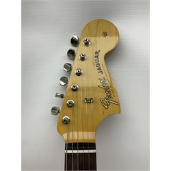 Mexican Fender Jaguar electric guitar with Humbucker pick-ups and tremolo arm, serial no.MX16741977, L101cm; in soft carrying case