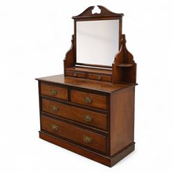 Edwardian walnut dressing chest, rectangular top surmounted by a mirror frame with shaped pediment on swing supports above two short frieze drawers over two short and three long graduated drawers fitted with brass foliate handles, raised on a plinth base