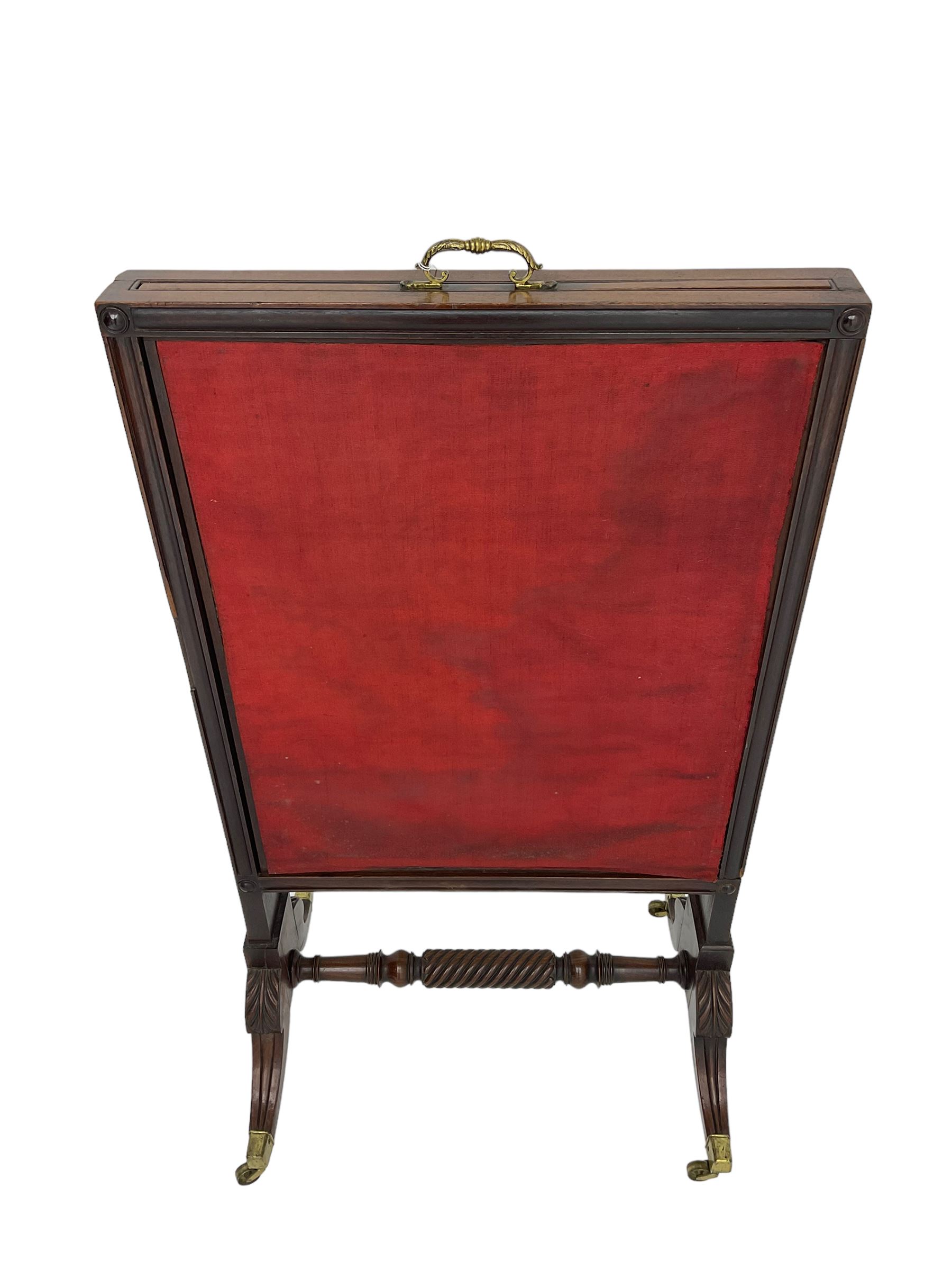 Regency mahogany screen with two horizontal and one vertical pull-out panels, on base with carved sabre legs and rope-twist stretcher