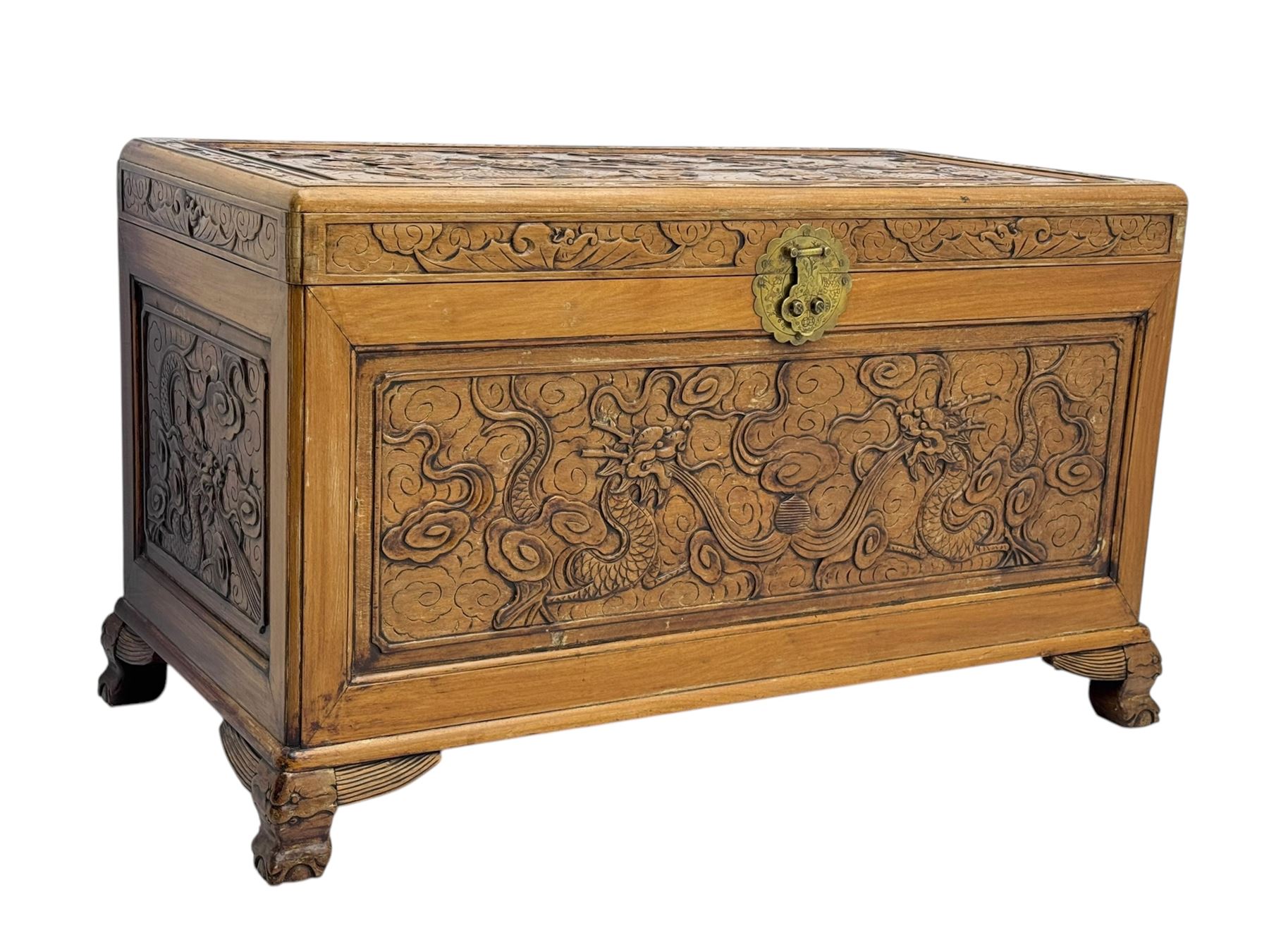 Chinese camphorwood blanket chest with stylized dragon carved decorated lid