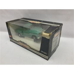 Seven 1:18 scale die-cast models by Ertl, Road legends, Maisto, Solido etc including two Coca Cola promotional vehicles; five boxed (7)