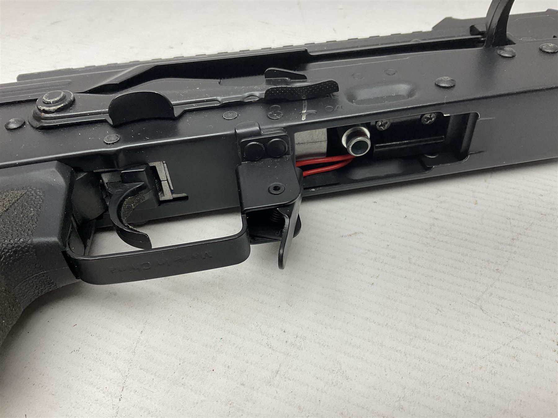 Airsoft AK47 electrically powered assault rifle, with two batteries, charger and two magazines; serial no.061630, L73cm Beretta Cx4 Storm .177 CO2 rifle with Hawke Red Dot 30 scope L78cm; in fitted hard carrying case with two magazines and 88g cylinder; NB: AGE RESTRICTIONS APPLY TO THE PURCHASE OF AIR WEAPONS.